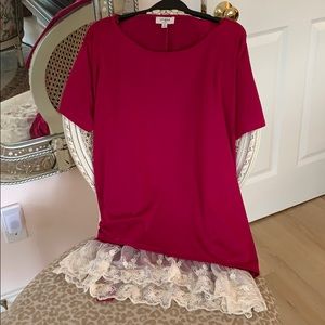 Fuschia Tie back tunic with lace hem.